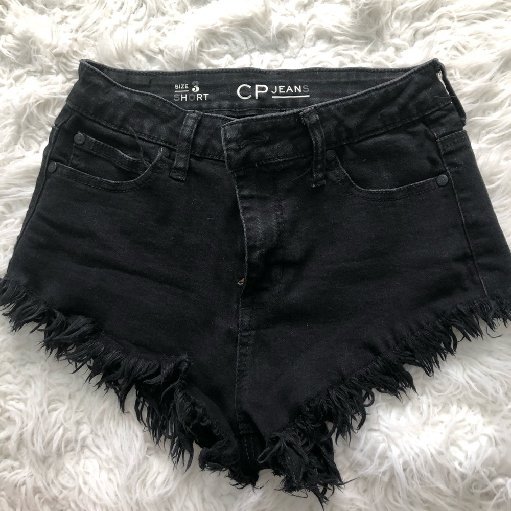 Distressed hem black shorts